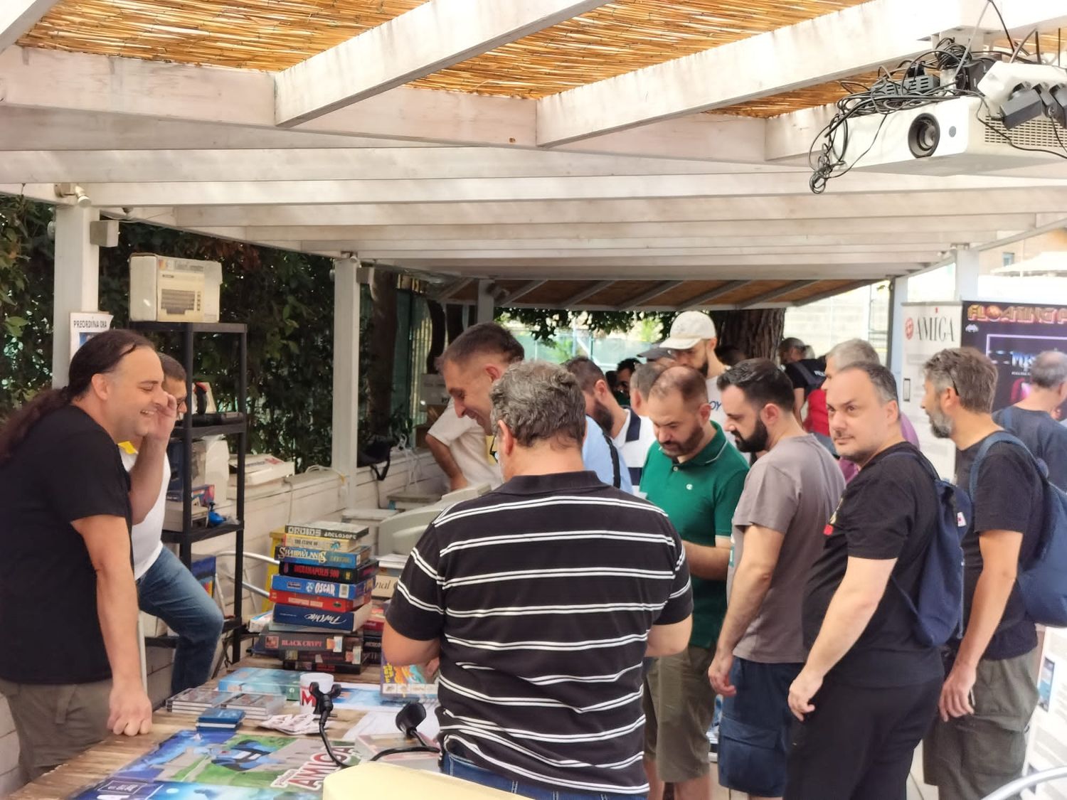 Visitors at the exhibitor tables
