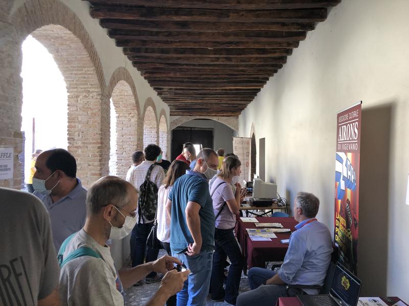 Visitors among the stands in the cloister