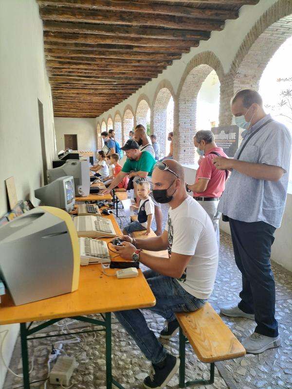 Trying out the computers along the arcade