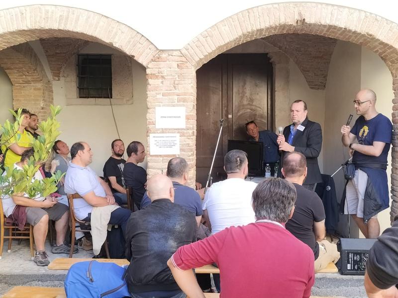 The audience follows a presentation