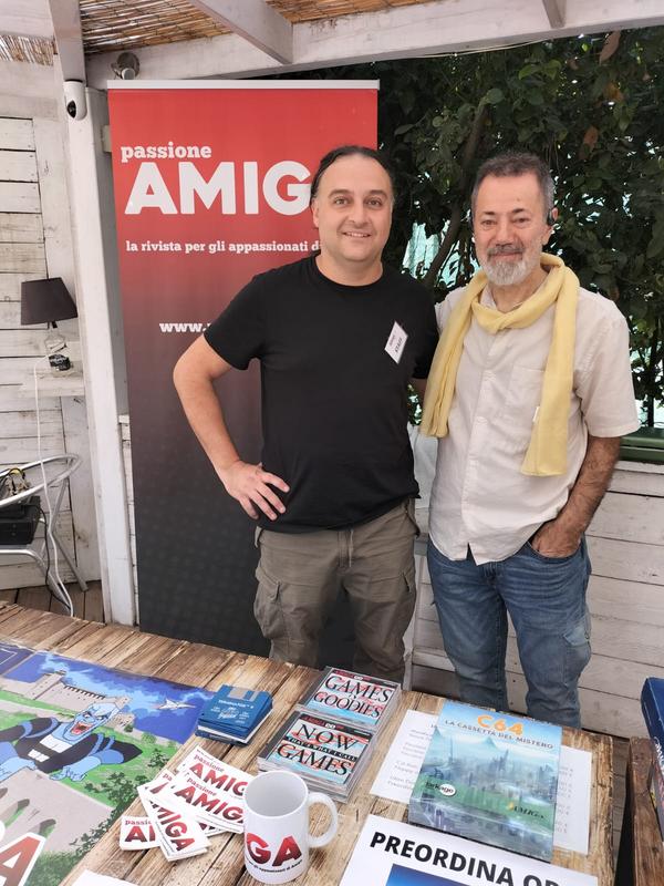 Two enthusiasts at the stand