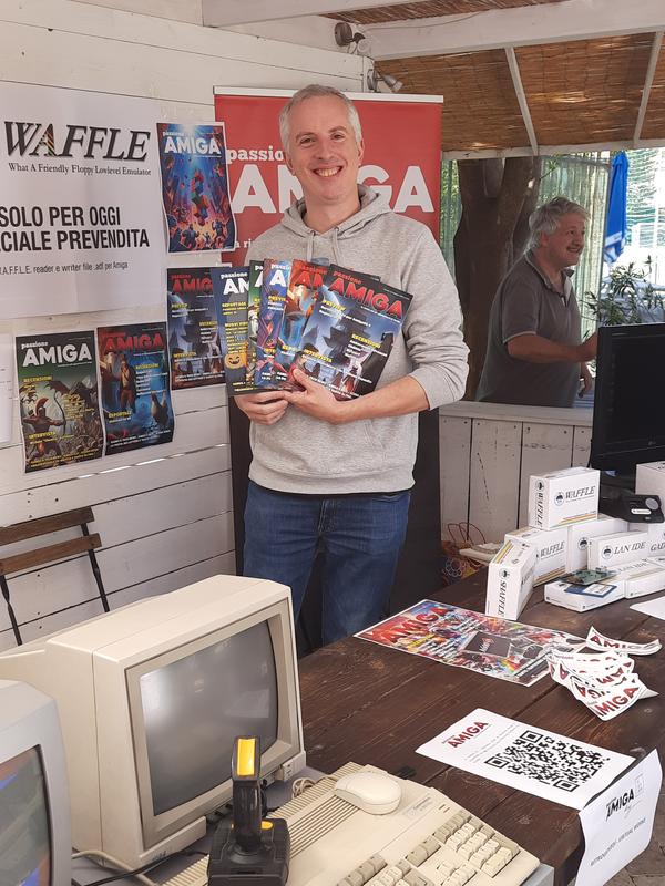 An exhibitor at his stand